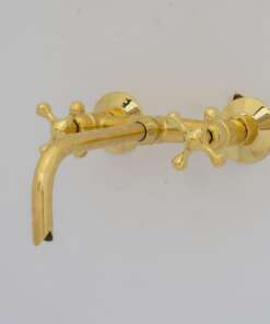 Handcrafted antique brass wall mount faucet for vintage and modern bathrooms