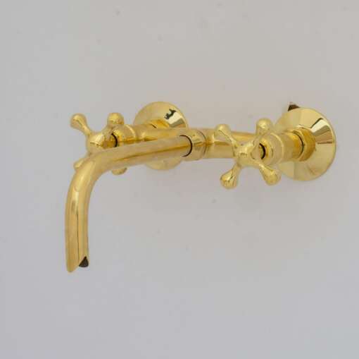 Handcrafted antique brass wall mount faucet for vintage and modern bathrooms