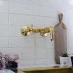 Handcrafted antique brass wall mount faucet for vintage and modern bathrooms