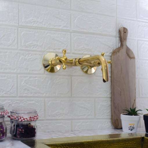 Handcrafted antique brass wall mount faucet for vintage and modern bathrooms