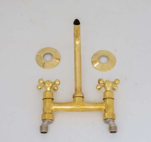 Handcrafted antique brass wall mount faucet for vintage and modern bathrooms