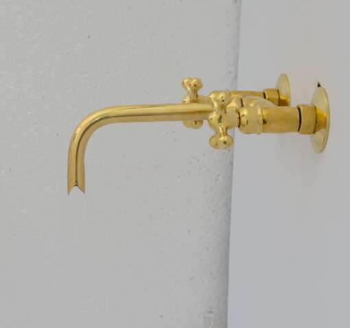 Handcrafted antique brass wall mount faucet for vintage and modern bathrooms