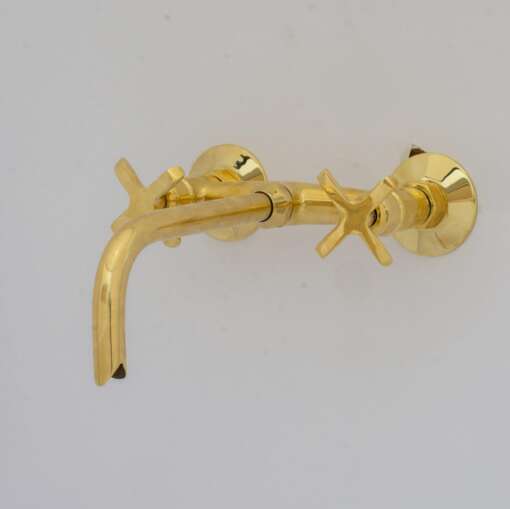 Handcrafted antique brass wall mount faucet for vintage and modern bathrooms