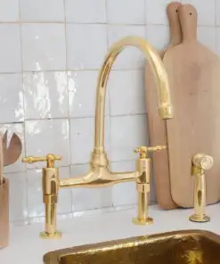 Vintage 8-inch unlacquered brass bridge faucet with lever handles for kitchen sinks