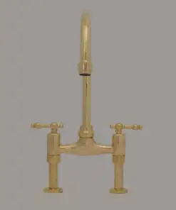 Vintage 8-inch unlacquered brass bridge faucet with lever handles for kitchen sinks