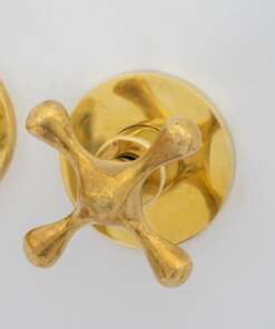 Unlacquered brass wall mount cold faucet with minimalist vintage design