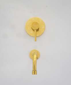 Wall mount tub filler with sleek design and brass finish for freestanding bathtubs