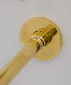 Wall mount tub filler with sleek design and brass finish for freestanding bathtubs