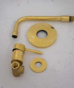 Wall mount tub filler with sleek design and brass finish for freestanding bathtubs