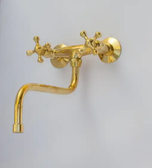 Antique brass kitchen faucet with wall-mount design