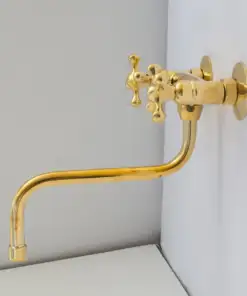 Antique brass kitchen faucet with wall-mount design