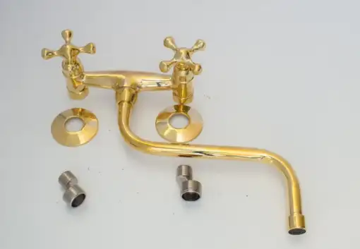 Antique brass kitchen faucet with wall-mount design