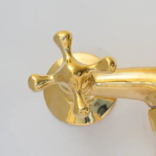 Antique brass kitchen faucet with wall-mount design