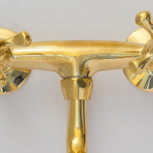 Antique brass kitchen faucet with wall-mount design